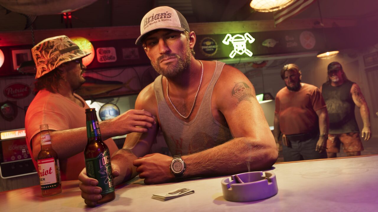 Jason Duval at a bar counter holding a beer bottle, wearing a boat-shop cap, two men standing behind him.