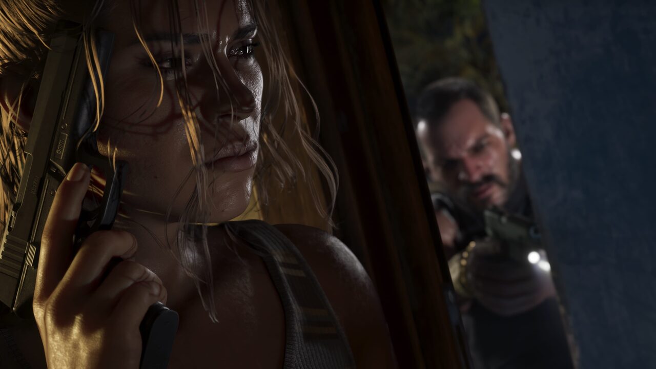 Lucia Caminos gripping a handgun close to her face in a dim room, a man aiming a pistol through a doorway behind her.