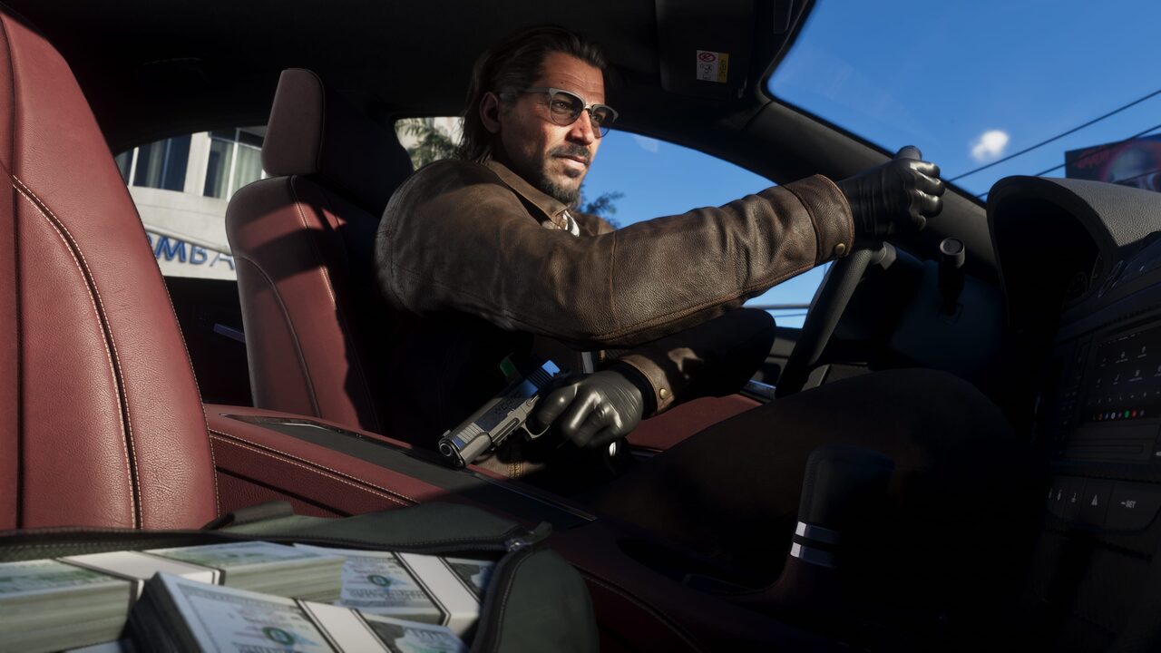 Raul Bautista driving a car with a handgun resting on his lap and stacks of cash on the seat beside him.