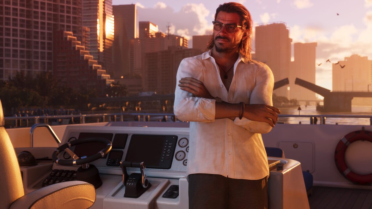 Raul Bautista standing with arms crossed on a yacht deck at sunset, a city skyline behind him.