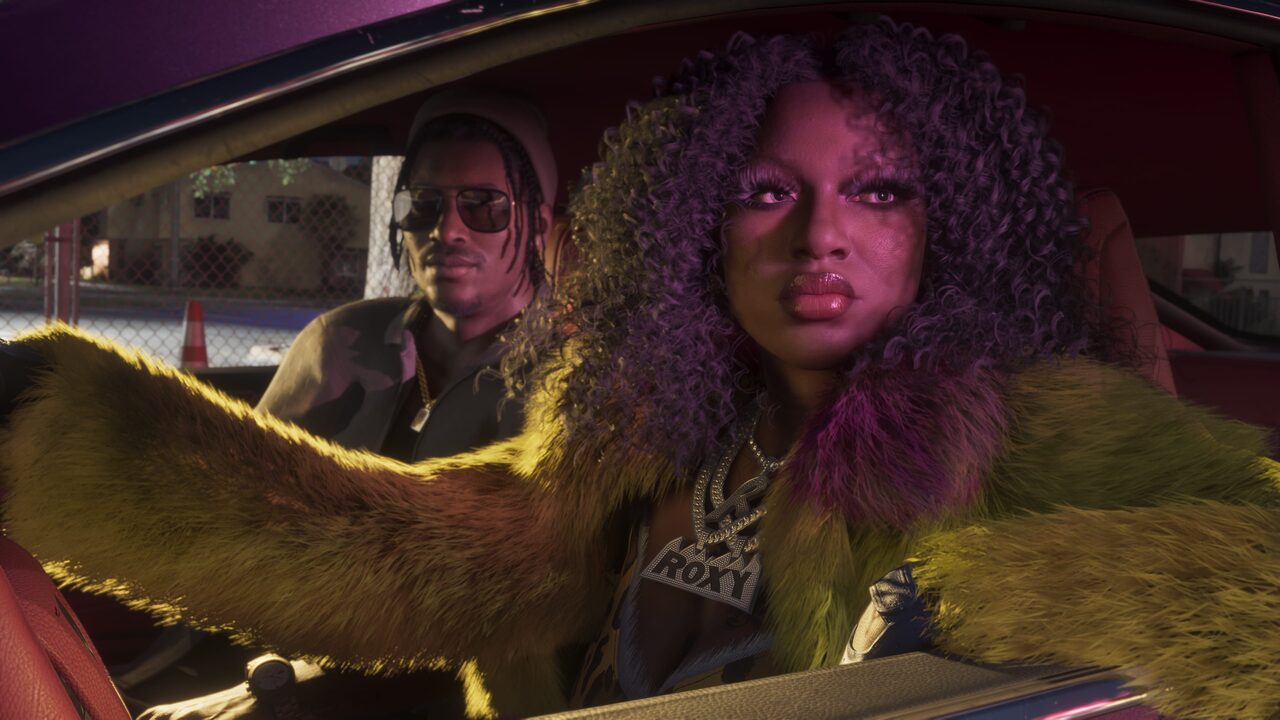 A woman in a green fur coat and a ROXY pendant leaning out of a car window, with a man in sunglasses in the driver seat beside her.