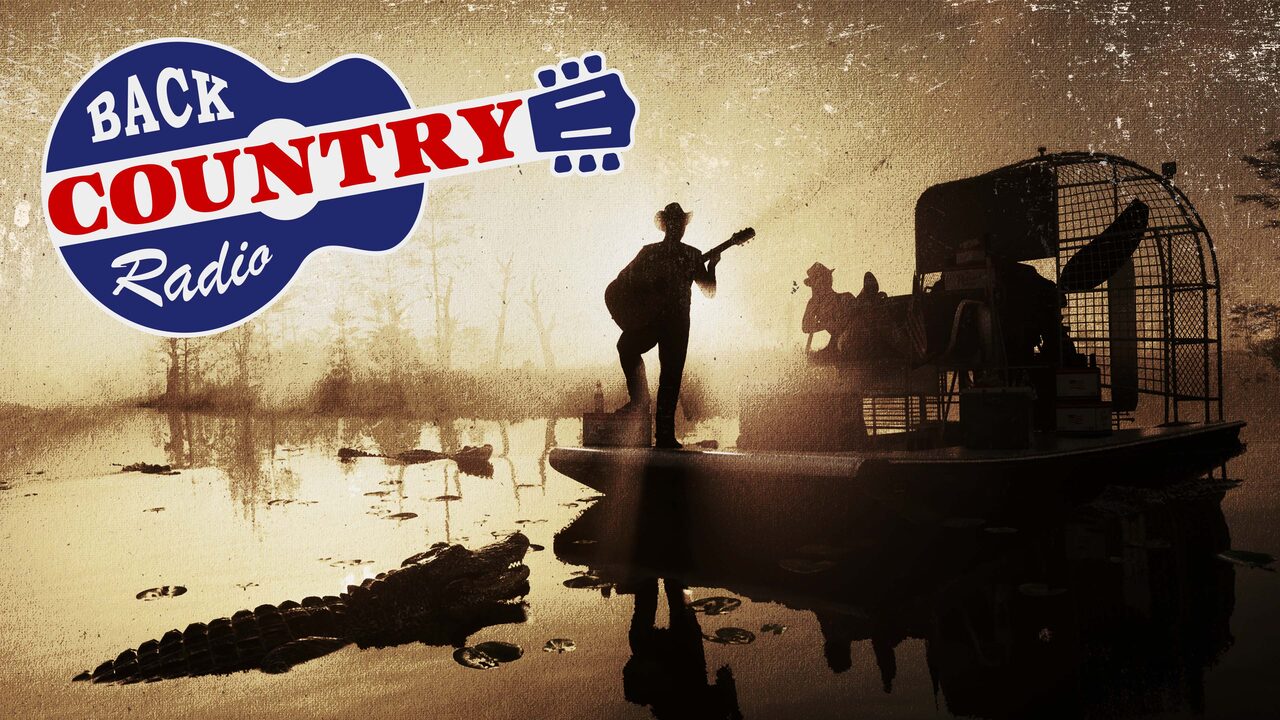 Sepia scene of a silhouetted figure in a cowboy hat playing guitar on an airboat in a swamp, an alligator in the water in front, beside the Back Country Radio logo shaped like a red, white and blue guitar.