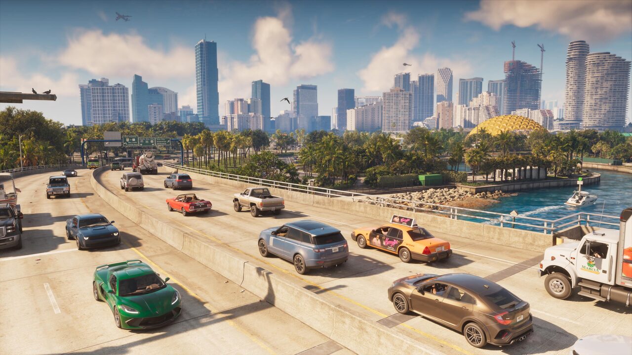 Traffic on a sunlit elevated highway, a green sports car, a taxi with a rooftop ad and a white truck among the cars, with palm trees, a golden dome by the water and the Vice City skyline behind.