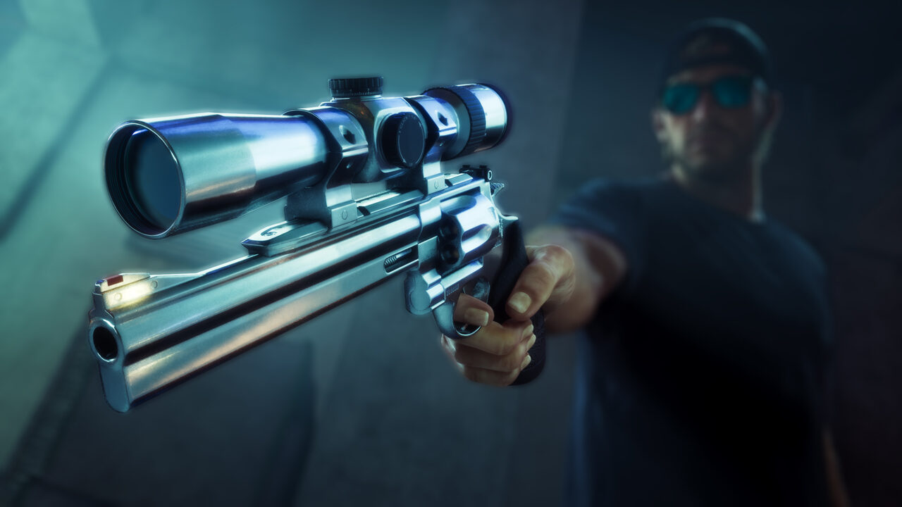 A man in a cap and sunglasses aiming a long-barrelled scoped revolver directly at the camera in dim light.