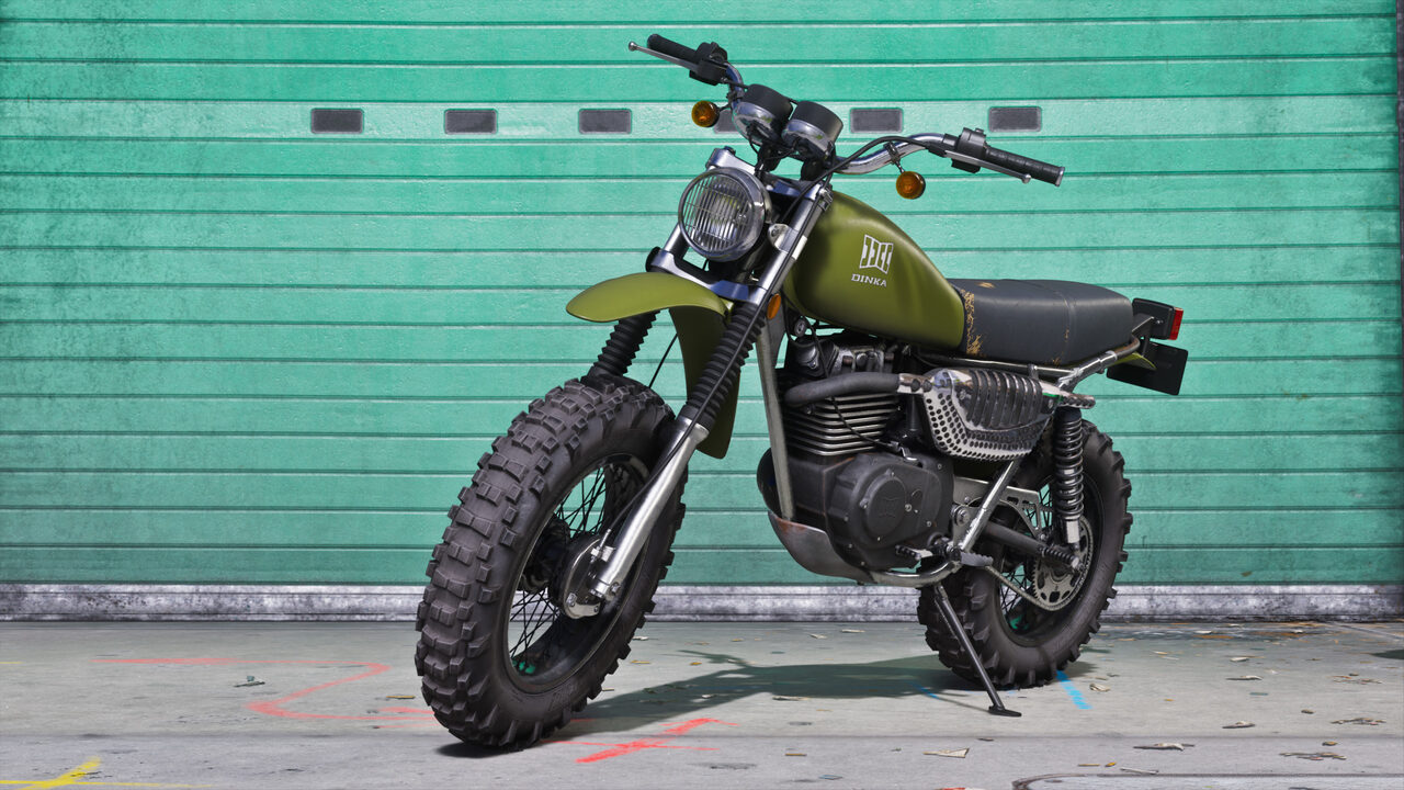 An olive green Dinka dirt bike with knobbly tyres on its stand in front of a turquoise roller shutter.