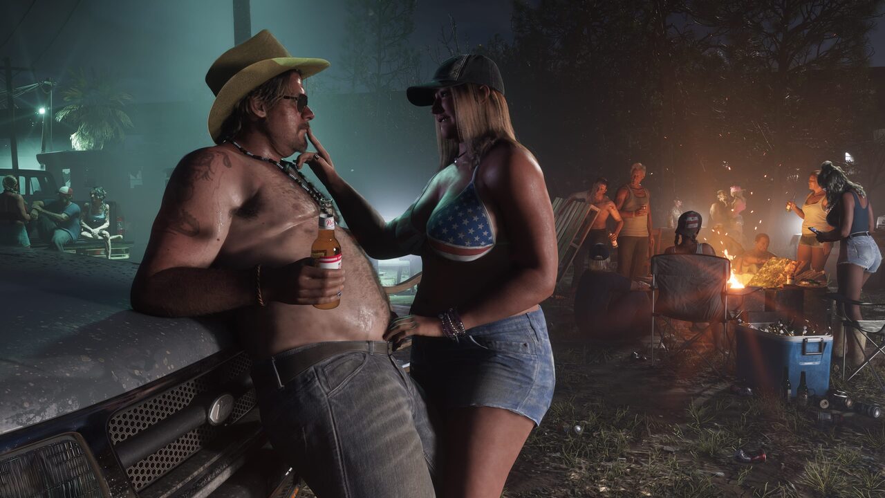 A man in a cowboy hat leaning on a truck bonnet with a beer while a woman talks to him, a bonfire cookout carrying on behind them at night.
